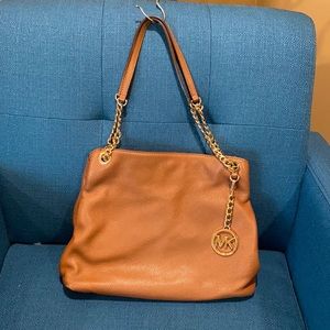 MICHAEL Michael Kors. Great gold accents